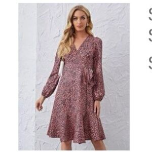 Knee length pink and black wrap dress size xs